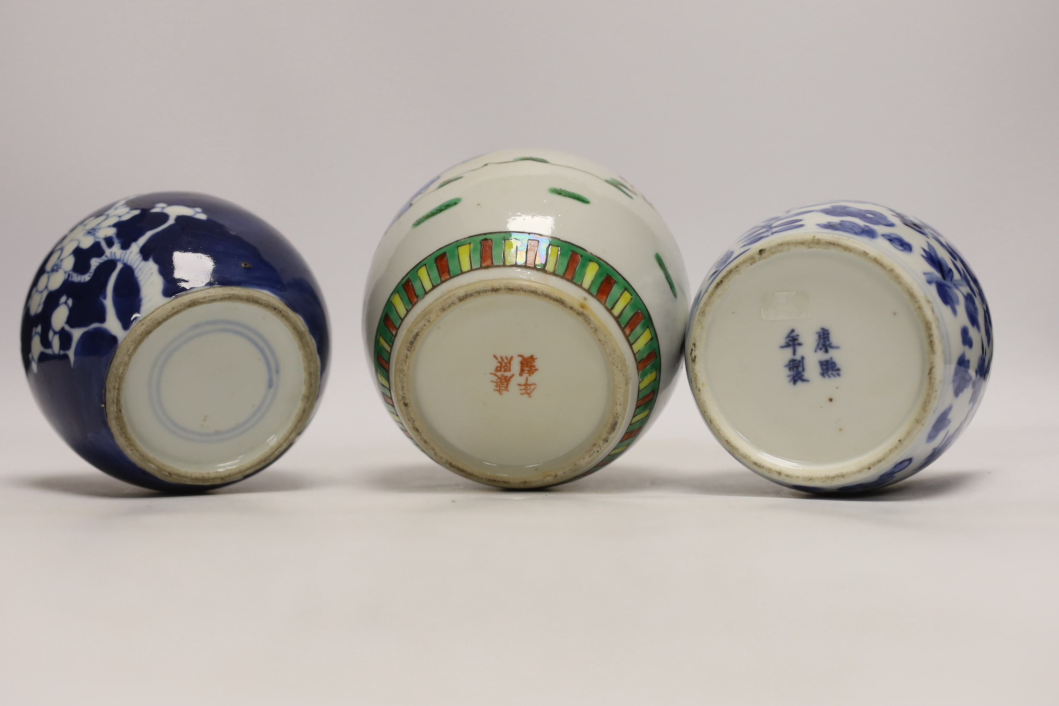 Three Chinese ginger jars, including a blue and white prunus example, Late 19th/early 20th century, largest 13cm high